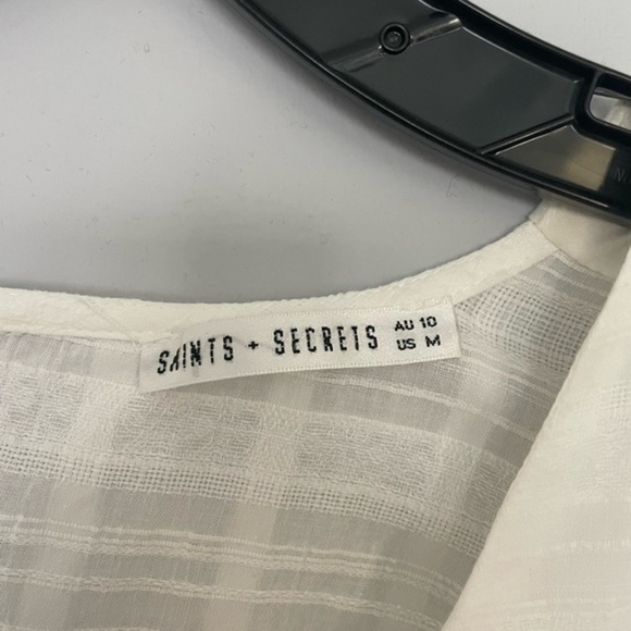 SAINTS & Secrets Flowy Romper with Sinched Waist Tie Front - Picture 9 of 9